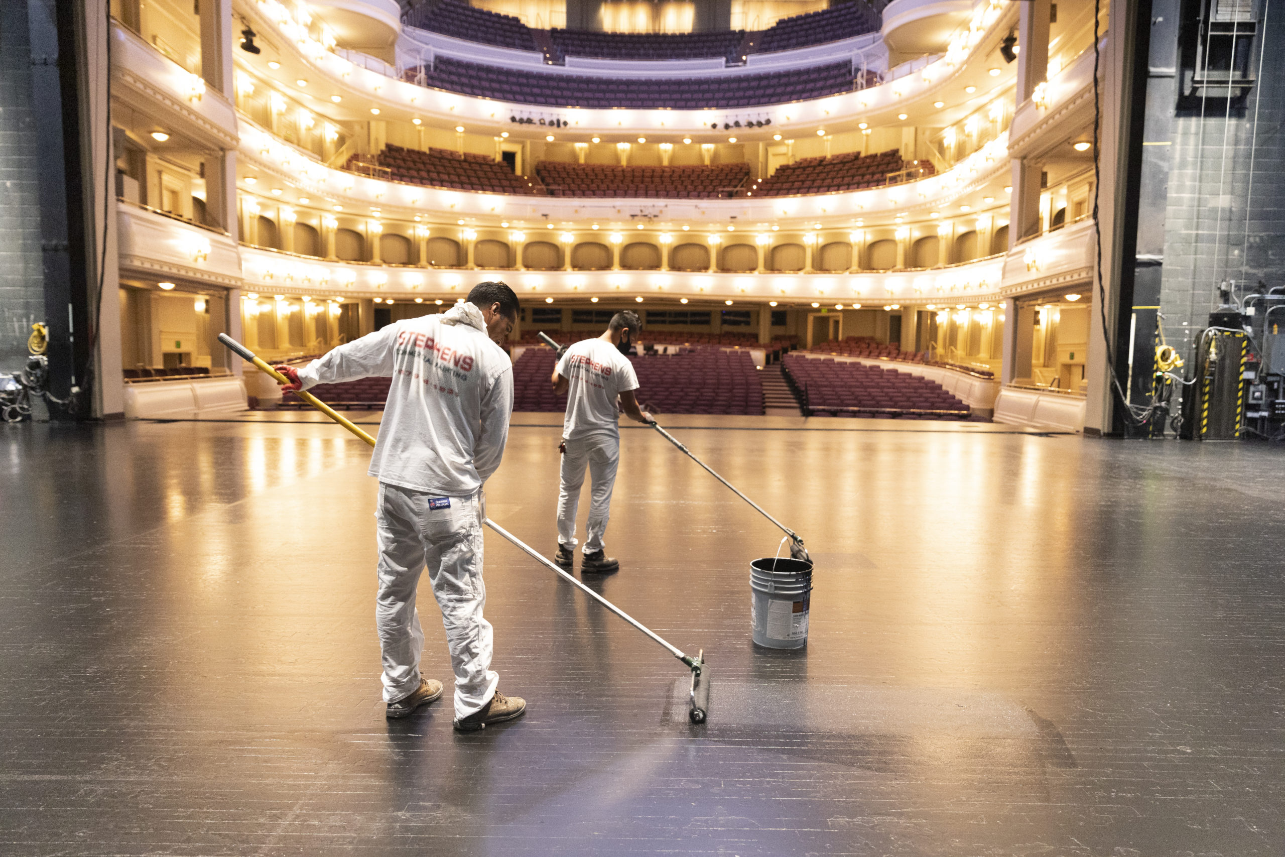 Stephens-Commercial-Painting-Commercial-Interior-Bass-Hall-Stage-being-coated-by-painters