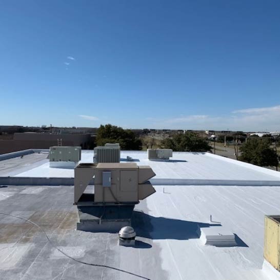 Stephens-Commercial-Painting-Roof-Coatings-Asphalt-Gallery-Image2-Roof-in-the-process-of-being-coated Asphalt Roofing Coating - Stephens Commercial Painting - Roof Coatings